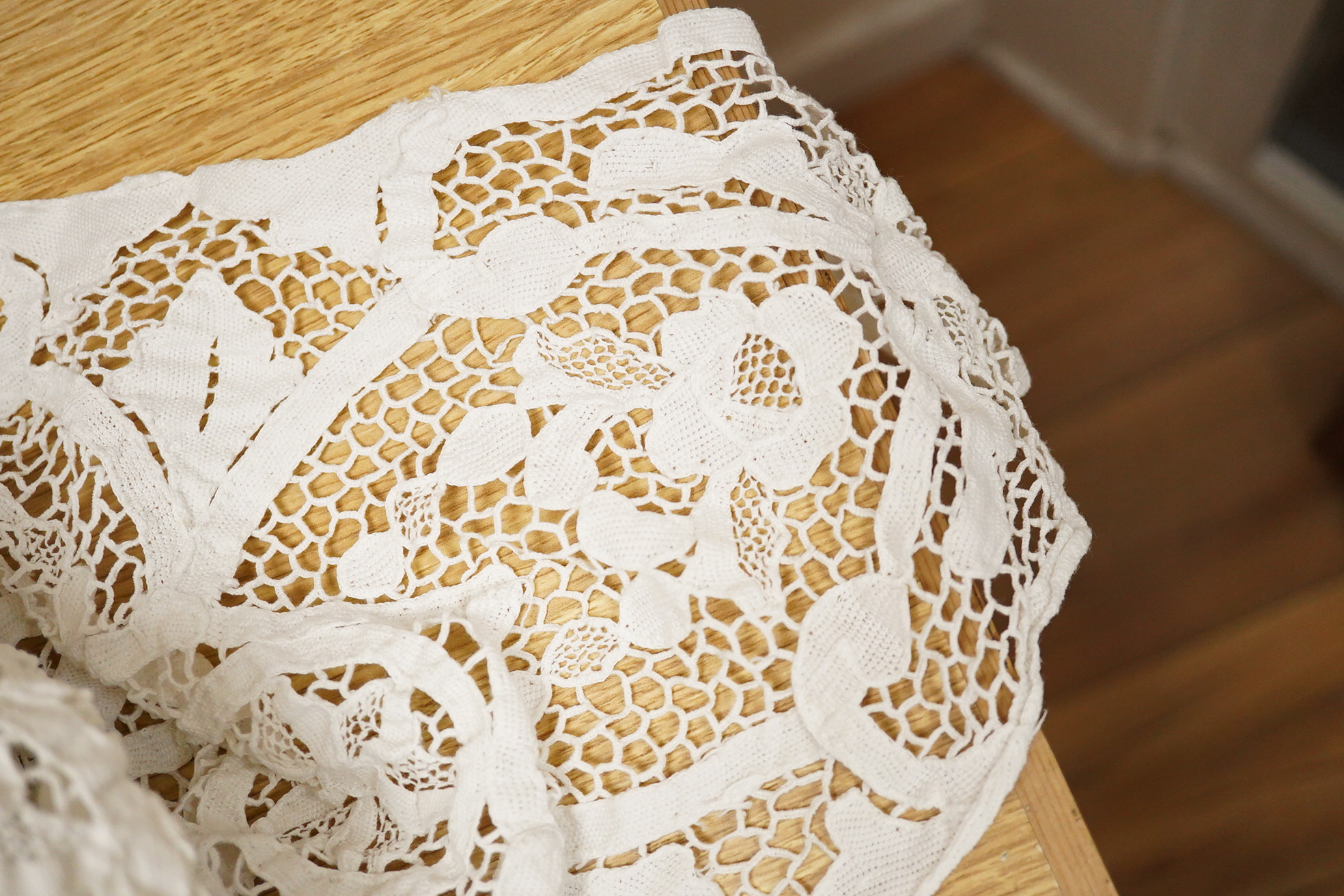 Two ornately designed tape lace bed covers, white cover 152cm x 236cm, beige cover 176cm x 364cm